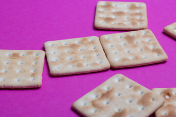 cracker cookies on a pink background