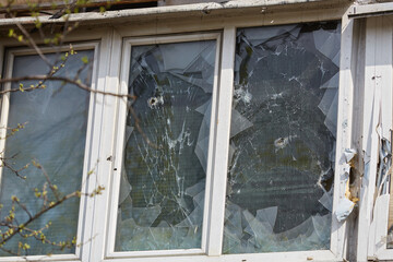 War of Russia against Ukraine. Residential building damaged by enemy aircraft in Ukrainian. Consequences of war, damaged grocery market by troops of Russian army. private house destroyed.