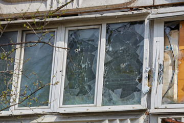 War of Russia against Ukraine. Residential building damaged by enemy aircraft in Ukrainian. Consequences of war, damaged grocery market by troops of Russian army. private house destroyed.