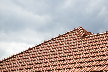 new red tiles roof and blue sky