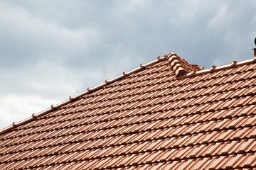 new red tiles roof and blue sky