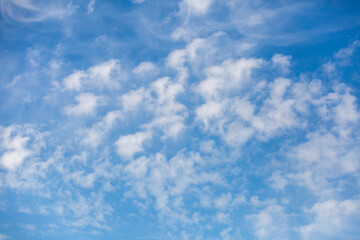 Dense white cloud in the blue sky