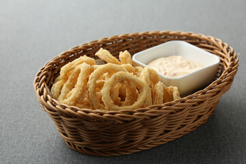 Fried calamari served with sauce 