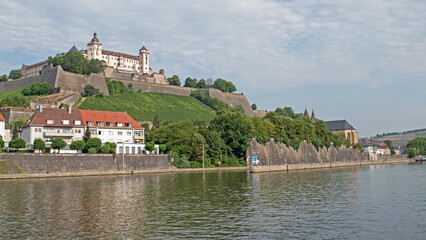Fototapeta na wymiar Marienberg Fortress keeps watch over Wurzburg, Germany along the Main River.