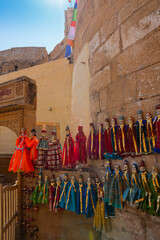 Traditional King and queen, called Raja Rani, handmade puppets or Katputli Sets are hanging from...