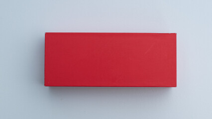 Red podium box on white wall background for displaying products and products.