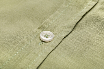 Closeup view of linen male shirt with button