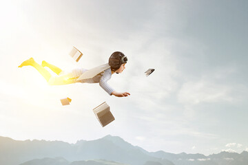 World of books concept with flying boy