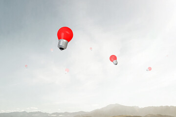 Light bulb on grey background