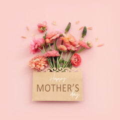 Fototapeta mother's day concept with pink flowers over pastel background obraz