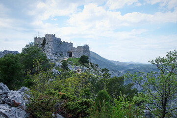 Fototapeta na wymiar Medieval fortress on the top of rocky mountain in Croatia
