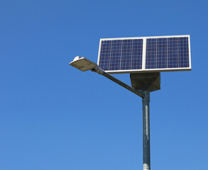 solar powered street lamp with photovoltaic panel and battery group for the accumulation of electricity to be used during night