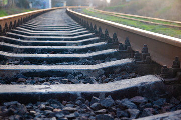 Railway tracks from a low point of view, close-up.