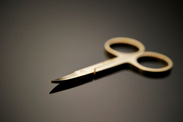nail scissors on a black background