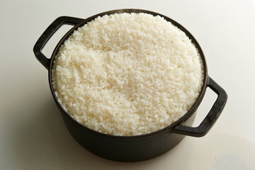 Ripe rice in a cast iron pot