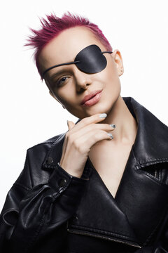 beautiful woman with pirate eye patch and short pink hair