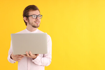 Concept of people with young man on yellow background