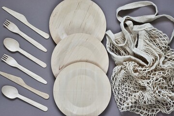 Biodegradable, eco friendly tableware set with cutlery. Plates, forks, spoons, knifes bamboo and...