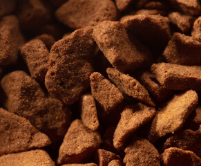 Instant coffee granules as background.