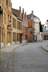 Romantic characteristic cobblestone alleyways streets and historic medieval brick old town houses...