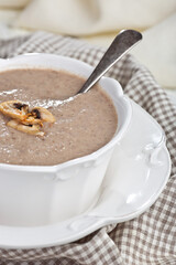 Porridge with fruits, Ukrainian cuisine. Photo of food on a white background