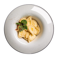 Isolated portion of ukrainian dumplings vareniki on white background