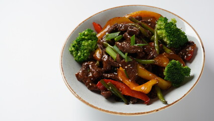 Mongolian barbecue with meat and vegetables in Thai restaurant