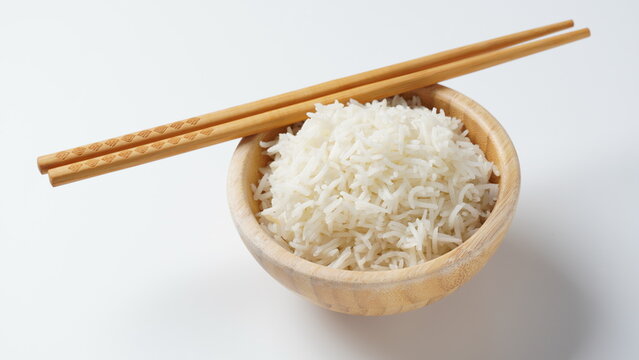 A bowl of perfectly cooked, plain Basmati rice, in an Asian style bowl