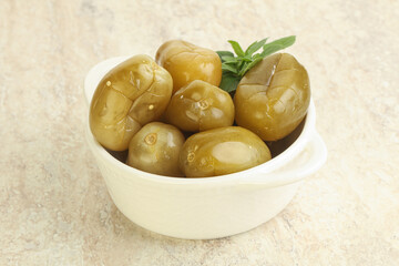 Pickled green tomato in the bowl