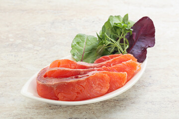 Sliced salmon fillet starter snack