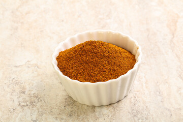 Dry Paprika powder in the bowl