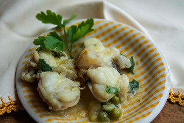 fish fillets in green sauce