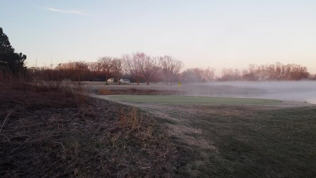 Golf Course Yellow Pin At A Cold Winter Morning