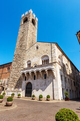 Fototapeta premium Brescia. Medieval Broletto Palace (Palazzo Broletto), XII-XXI century, with the ancient tower (Torre del Popolo o del Pegol) and the Loggia of Cries (Loggia delle Grida). Lombardy, Italy, Europe.