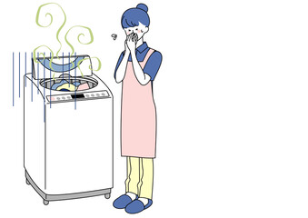 洗濯機の悪臭に困る女性