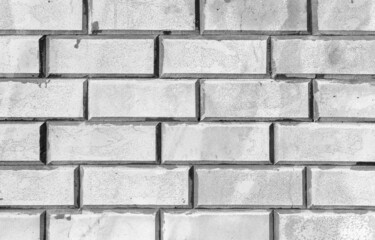 White brick wall, close up monochrome background texture