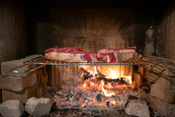 Barbecue Italian Fiorentina steak on the grill