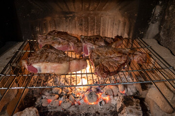 Barbecue Italian Fiorentina steak on the grill - 501683386