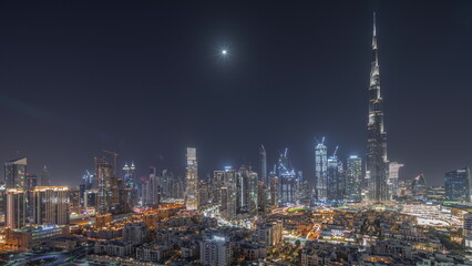 Obraz premium Dubai Downtown all night timelapse with tallest skyscraper and other towers