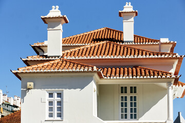 tiled roof and chimney on old railways station in Aveiro, Portugal