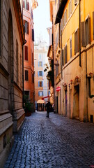 Fototapeta na wymiar narrow yellow street in venice italy 