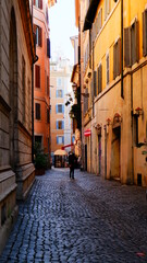 Fototapeta na wymiar View of old narrow street in Rome, Italy