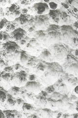 coarse stone texture. Stone surface photo. Chipped stone surface with cutter marks. Natural construction material. Weathered grey stone banner template. Grunge background.	
