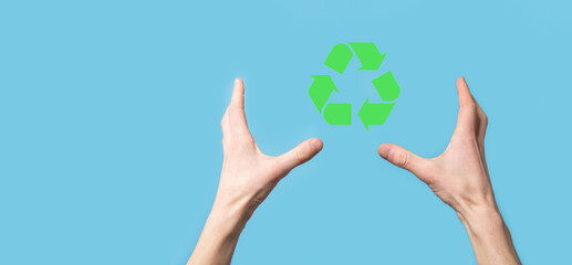 Hand hold recycling icon.Ecology and renewable energy concept.ECO sign, Concept Save green planet. Symbol of environmental protection.Recycling waste.Symbol of earth day, concept of nature protection