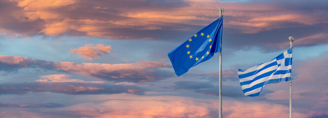 The European and the Greece  flag at sunset. - obrazy, fototapety, plakaty