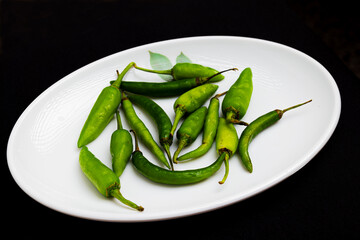 green chillies (pacha mulaku) in white plate