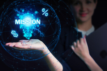 Business, Technology, Internet and network concept. Young businessman working on a virtual screen of the future and sees the inscription: Mission