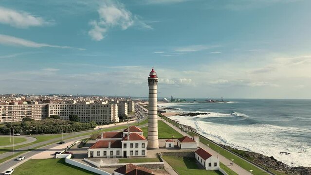 Aerial view over the lighthouse of  Le&ccedil;a da Palmeira, Matosinhos with the city and coastline behind.