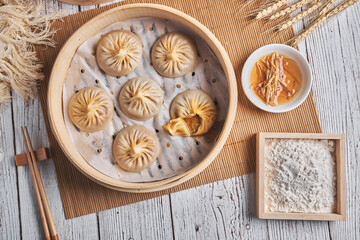 Chinese steamed Buns or Xiaolongbao with crab meat and roe.