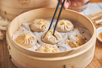 Chinese steamed Buns or Xiaolongbao with crab meat and roe.